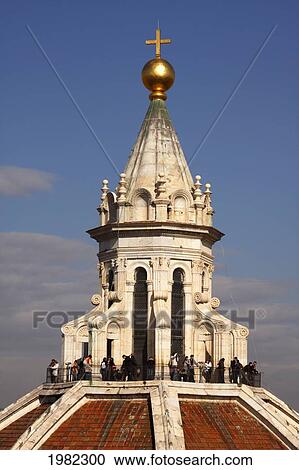Stock Image - Tourists Standing On Top Of The Florence Cathedral Dome; Florence Tuscany Italy. Fotosearch