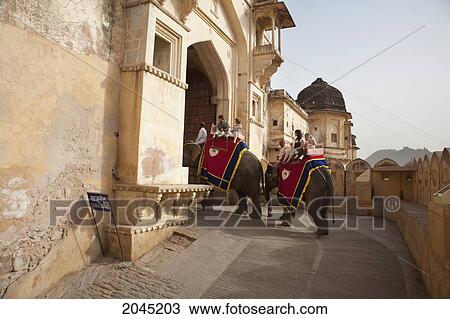 Tourists Take An Elephant Ride To Get To Amber Fort, Rajasthan, India View Large Photo Image Stock Image - Tourists Take An Elephant Ride To Get To Amber Fort, Rajasthan, India. Fotosearch