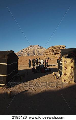 Stock Photograph - Tourists Waiting To Be Transported Back From The Captain's Eco Desert Camp, Wadi Rum, Jordan, Middle East. Fotosearch