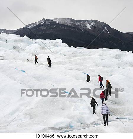 Tourists walk on Moreno Glacier, Los Glaciares National Park; Santa Cruz province, Argentina View Large Photo Image Stock Photograph - Tourists walk on Moreno Glacier, Los Glaciares National Park; Santa Cruz province, Argentina. Fotosearch