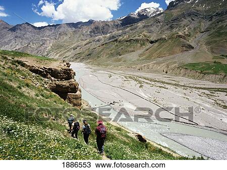 Tourists Walking Through The Himalayas View Large Photo Image Stock Image - Tourists Walking Through The Himalayas. Fotosearch