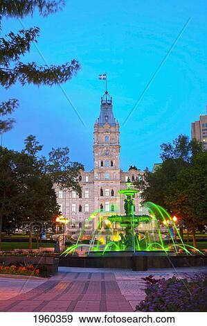 Tourny Fountain And The Quebec Parliament Buildings; Quebec City, Quebec, Canada View Large Photo Image Stock Photo - Tourny Fountain And The Quebec Parliament Buildings; Quebec City, Quebec, Canada. Fotosearch