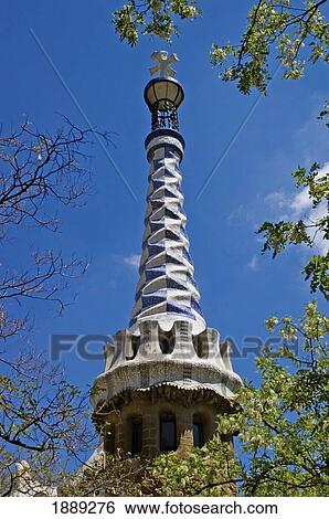 Stock Photograph - Tower And Tree At Parc Guell. Fotosearch