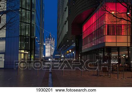 Stock Image - Tower Bridge and More Place at nighttime; London, England. Fotosearch