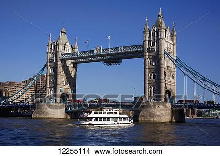Tower Bridge and river boat; London, England View Large Photo Image Picture - Tower Bridge and river boat; London, England. Fotosearch