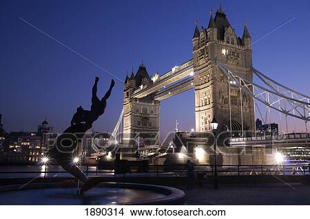 Picture - Tower Bridge At Dusk With Dolphin Statue In The Foreground. Fotosearch