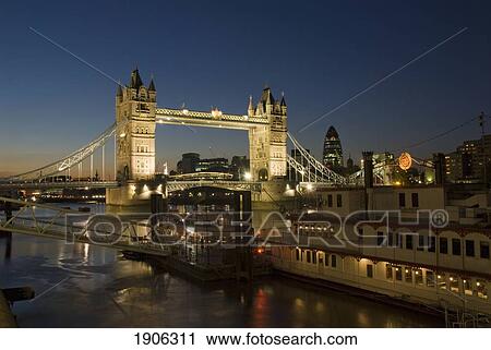 Stock Image - Tower Bridge Illuminated At Night, London, England, Uk. Fotosearch