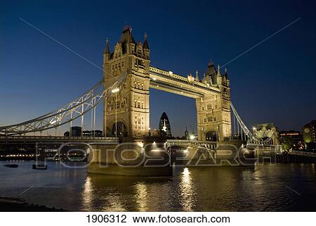 Stock Image - Tower Bridge Illuminated At Night, London, England, Uk. Fotosearch