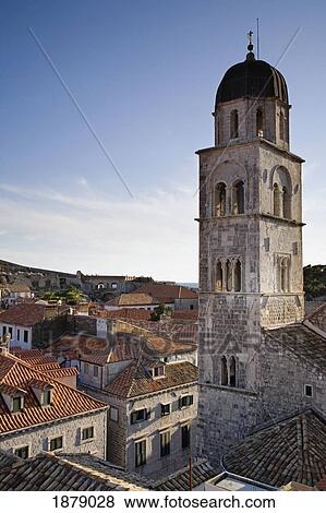Tower Of Saint Saviours Church And Rooftops. View Large Photo Image Stock Photo - Tower Of Saint Saviours Church And Rooftops.. Fotosearch
