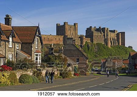 Stock Photo - Town Of Bamburgh With Bamburgh Castle In Background, Bamburgh, Northumberland, England, Uk. Fotosearch