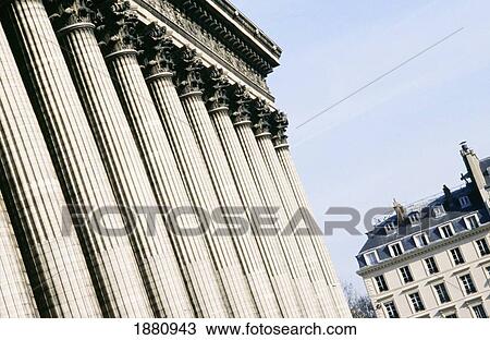 Stock Image - Townhouses And Ste Marie Madeline, Paris. Fotosearch