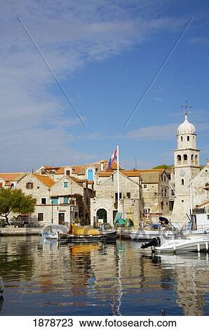 Stock Image - Townscape With Harbour. Fotosearch