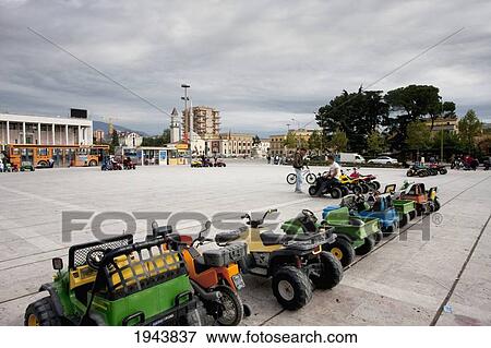 Toy car ride on Skanderbeg Square, Tirana, Albania View Large Photo Image Stock Photo - Toy car ride on Skanderbeg Square, Tirana, Albania. Fotosearch