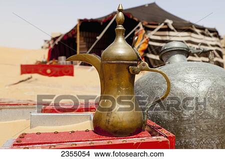 Picture - Traditional Arab teapot; Liwa Oasis, Abu Dhabi, United Arab Emirates. Fotosearch
