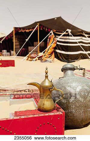 Traditional Arab teapot; Liwa Oasis, Abu Dhabi, United Arab Emirates View Large Photo Image Stock Photograph - Traditional Arab teapot; Liwa Oasis, Abu Dhabi, United Arab Emirates. Fotosearch