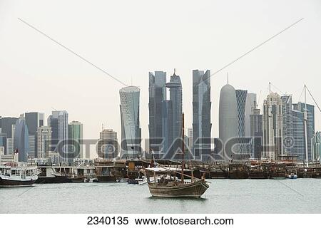 Stock Photography - Traditional Arabic Dhow Boats On Corniche; Doha, Na, Qatar. Fotosearch