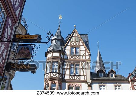 Traditional architecture against a blue sky; Mosel, Germany View Large Photo Image Stock Photo - Traditional architecture against a blue sky; Mosel, Germany. Fotosearch
