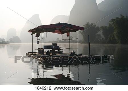 Stock Image - Traditional Asian Pavilion On Lake In Mountain Area. Fotosearch
