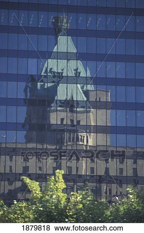 Stock Photo - Traditional Building Reflected In Modern Skyscraper. Fotosearch