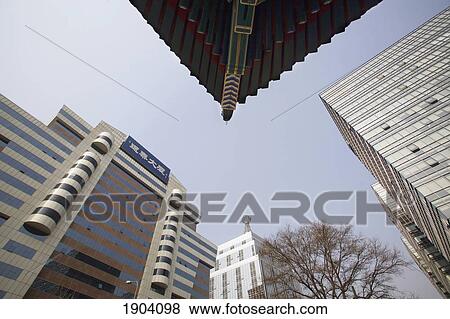 Stock Photo - Traditional Buildings And Modern Skyscrapers In Beijing, China. Fotosearch