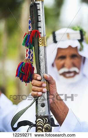 Stock Image - Traditional ceremony; Saudi Arabia. Fotosearch