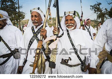 Stock Image - Traditional ceremony; Saudi Arabia. Fotosearch