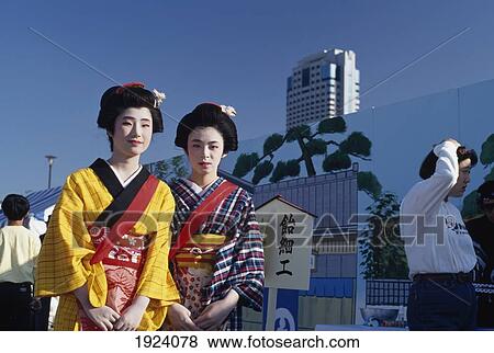 Stock Photo - Traditional Clad Women. Fotosearch