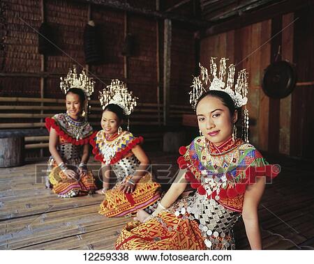 Stock Photo - Traditional dancers at the Sarawak Cultural Centre; Sarawak. Fotosearch