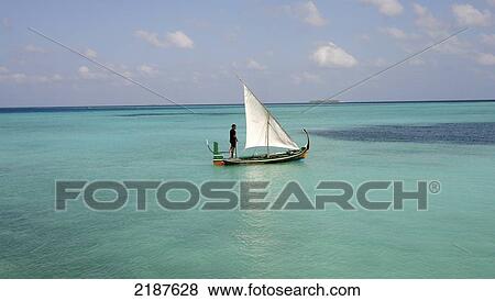 Stock Photo - Traditional dhoni sailboat; Maldives. Fotosearch