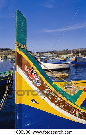 Stock Photograph - Traditional Fishing Boat In Luzzu Harbor. Fotosearch