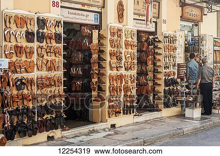 Stock Photo - Traditional footwear for sale; Athens, Greece. Fotosearch