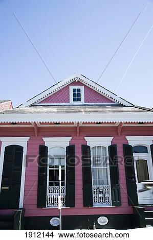 Traditional French Building Painted Pink, French Quarter, New Orleans, Louisiana, Usa View Large Photo Image Picture - Traditional French Building Painted Pink, French Quarter, New Orleans, Louisiana, Usa. Fotosearch