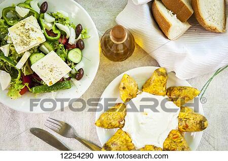 Traditional Greek meal; Lasithi Plateau, Crete, Greece View Large Photo Image Stock Image - Traditional Greek meal; Lasithi Plateau, Crete, Greece. Fotosearch