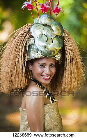 Stock Photo - Traditional headress worn by young Samoan woman; Upulu Island, Samoa. Fotosearch