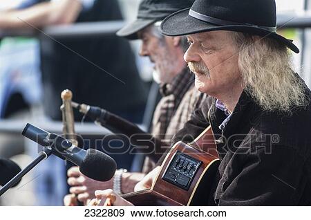 Traditional musicians at music festival; Dingle, County Kerry, Ireland, UK View Large Photo Image Stock Photo - Traditional musicians at music festival; Dingle, County Kerry, Ireland, UK. Fotosearch