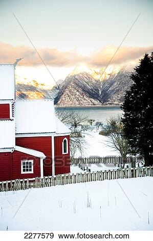 Stock Photo - Traditional red church building in the village; Ortnevik, Sognefjord, Norway. Fotosearch