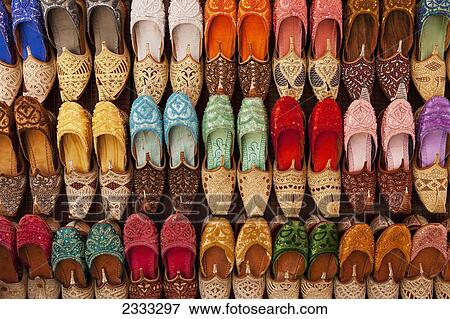Stock Photo - Traditional Shoes For Sale In Market; Dubai, United Arab Emirates. Fotosearch