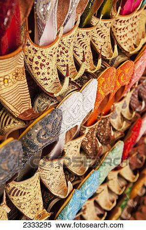 Stock Photography - Traditional Shoes For Sale In Market; Dubai, United Arab Emirates. Fotosearch