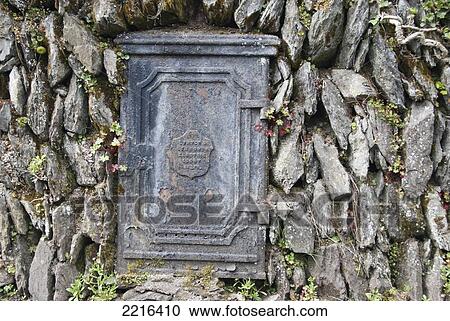 Traditional Stone Wall And With Curious Metal Door On The South West Coast Path Near Lynmouth, Exmoor, United Kingdom View Large Photo Image Stock Image - Traditional Stone Wall And With Curious Metal Door On The South West Coast Path Near Lynmouth, Exmoor, United Kingdom. Fotosearch
