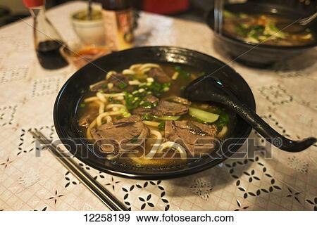Stock Photo - Traditional Taiwanese beef noodle soup made in a Jincheng's local restaurant; Kinmen Island, Taiwan. Fotosearch