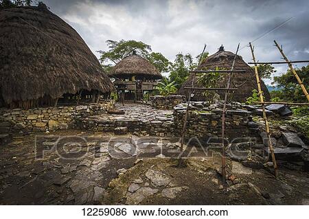 Stock Photograph - Traditional Timorese house at Liurai Village; Timor-Leste. Fotosearch