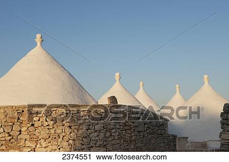 Traditional trulli at La Rosa dei Quattro Venti yoga retreat; Puglia, Italy View Large Photo Image Stock Image - Traditional trulli at La Rosa dei Quattro Venti yoga retreat; Puglia, Italy. Fotosearch