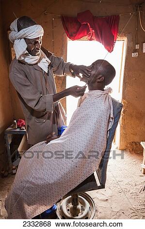 Stock Photo - Traditional Tuareg Barber; Niger. Fotosearch