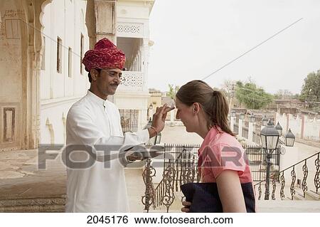 Stock Photograph - Traditional Welcome To The Indra Vilas Heritage Resort In Alsisar, Rajasthan, India. Fotosearch
