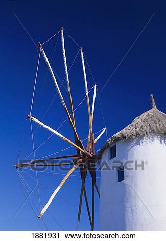 Stock Image - Traditional Windmill Against Clear Sky. Fotosearch