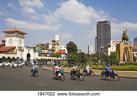 Stock Image - Traffic Circle On Le Loi Blvd; Ho Chi Minh City (Saigon), Southern Vietnam, Vietnam. Fotosearch
