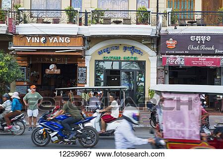 Stock Photo - Traffic in Phnom Penh riverside; Phnom Penh, Cambodia. Fotosearch