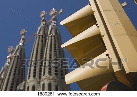 Stock Image - Traffic Light In Front Of Sagrada Familia.. Fotosearch