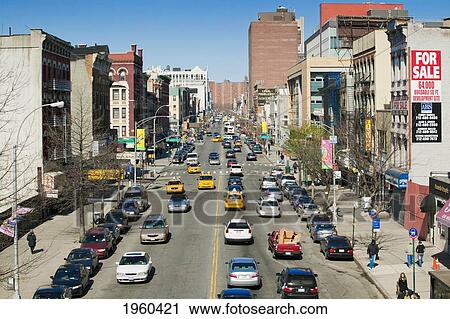 Stock Image - Traffic On 125 Street In Harlem; New York City, New York, United States Of America. Fotosearch