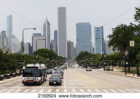 Picture - Traffic On A Busy Road With Skyscrapers In The Background; Chicago Illinois United States Of America. Fotosearch